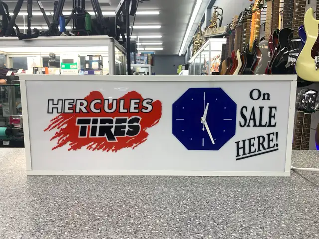 Hercules Tires Sign
