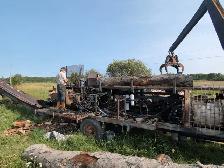 Large PTO Driven Grapple Wood Processor & 5 cord Dump Trailer.