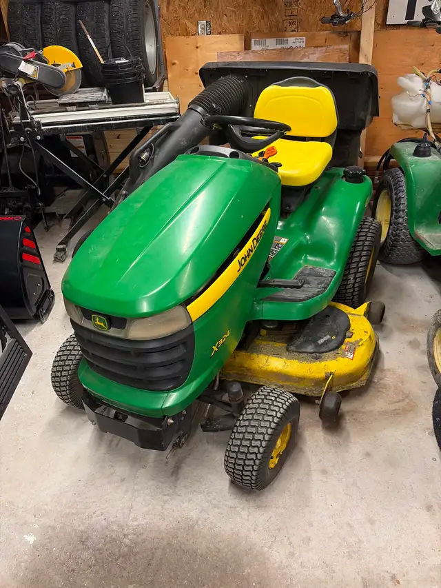 John Deere lawn tractor for sale 324 quad steering 548 hours