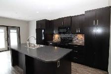 Three Bedroom Upper Suite in Harbour Landing Available Aug.1 - Photo 2