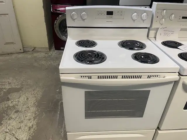 Cuisinière blanche ronds serpentins Amana