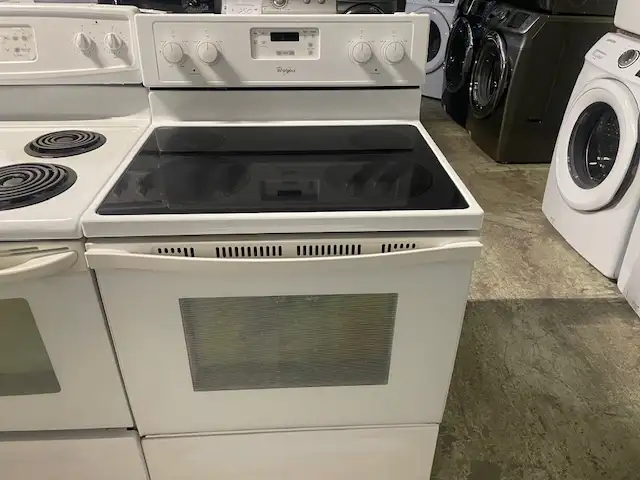 Cuisinière blanche vitrocéramique Whirlpool