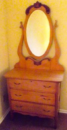 Two antique blonde dressers ..... $100.00 each
