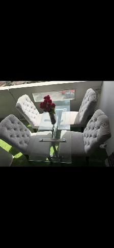 Dining table with four chairs in great condition