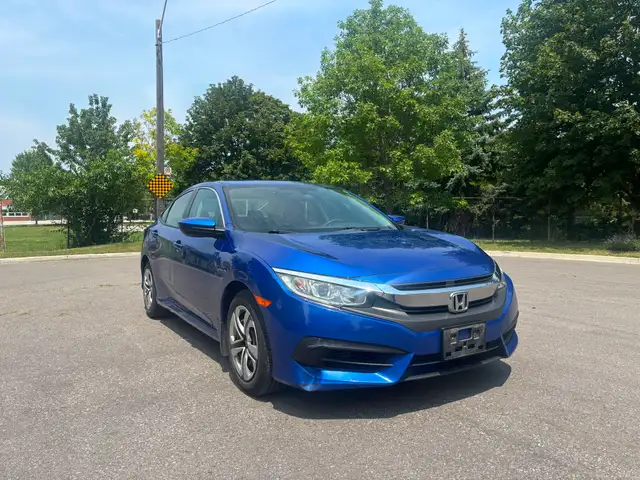 2018 Honda Civic Sedan LX •  Honda Sense Backup Camera