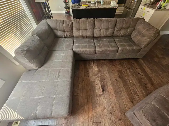 Used Sectional Couch (114') and Ottoman (35'x35') for Sale