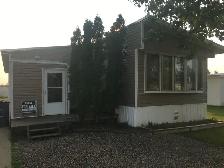 Affordable 4-Bed Family Home with Prairie Views – Caronport, SK