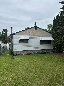 FAMILY HOME FOR SALE W/ 3 BEDROOMS & A FINISHED BASEMENT