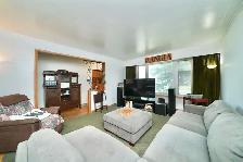 3 BEDROOM/2 BATHROOM BUNGALOW WITH A FULL BASEMENT AND GARAGE - Photo 2