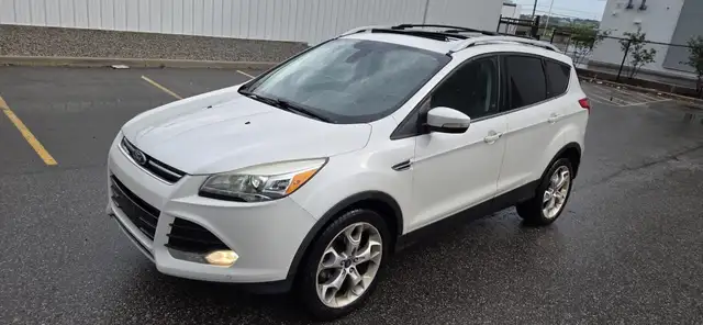 2015 Ford Escape Titanium 4dr SUV AWD (1.6L 4cyl Turbo 6A)