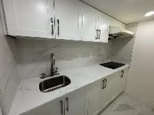 studio/bachelor at basement with private kitchen & bath - Photo 3