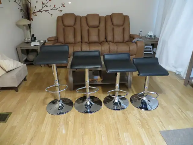 4 Black bar stools. A-1- condition for sale cash only $135.00 or