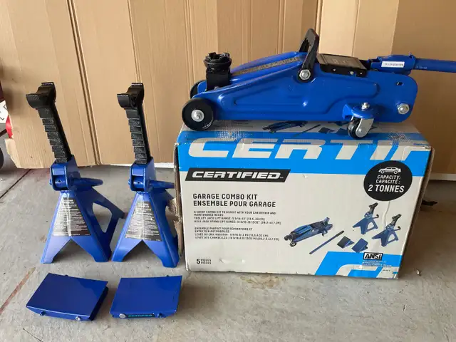 "(NEW"). Never used.  Jack and 2 stands, also 2 wheel chalks