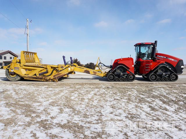 Tractor-Pull Scraper Operator