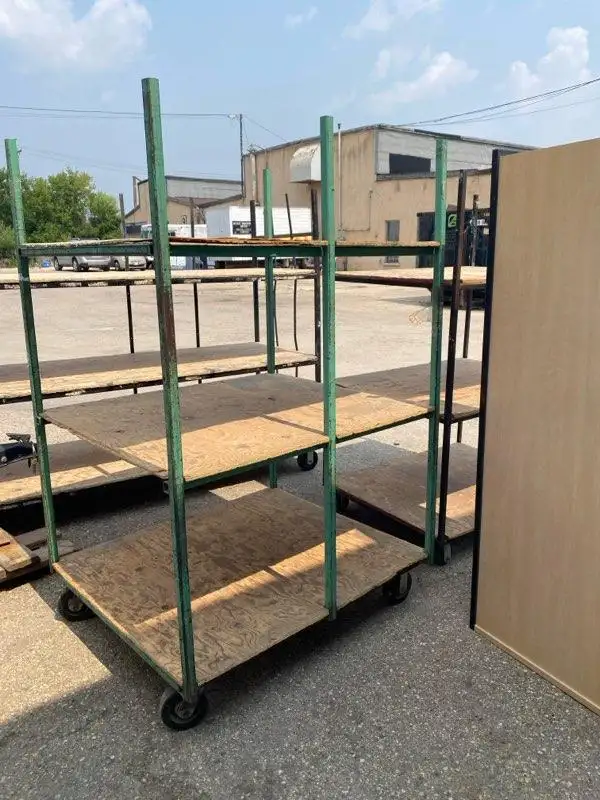 Several heavy duty castered shelving units,