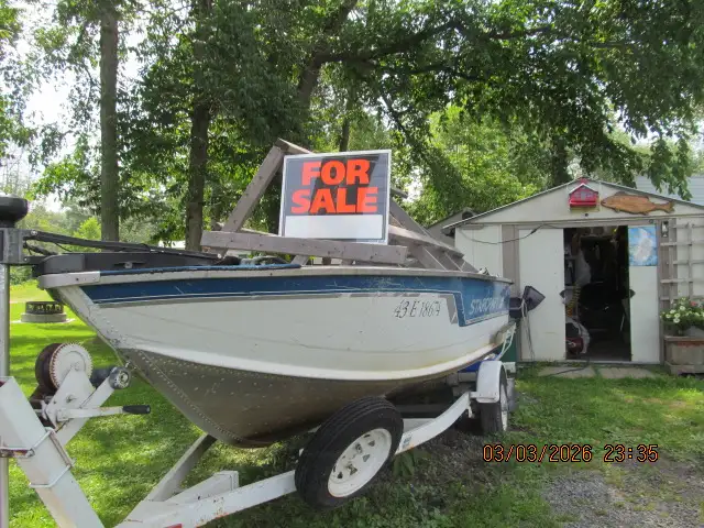 Boat 15 ft StarCraft  40 hp motor and trailer