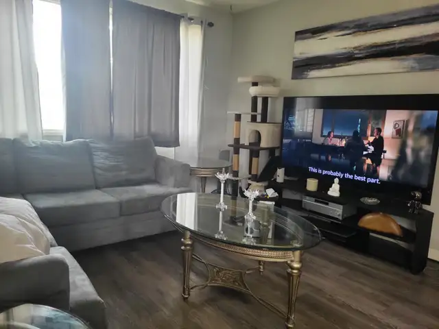 Glass top coffee table with matching end tables