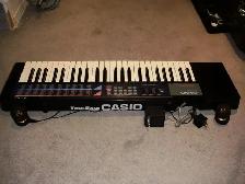 JAPANESE-MADE SYNTHESIZER, $130.