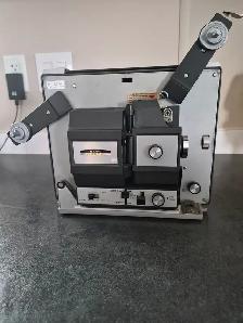 BELL and HOWELL MOVIE PROJECTOR  $100 O.B.O.