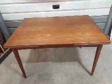 dining room table and three chairs