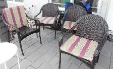 4 Rattan chair with cushions excellent condition they stacked up