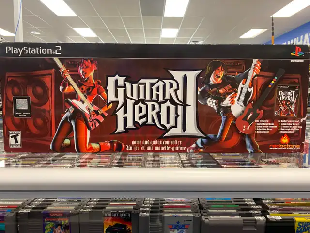 PS2 Guitar Hero II w/ Guitar, Box, Stickers, Games @ Cashopolis