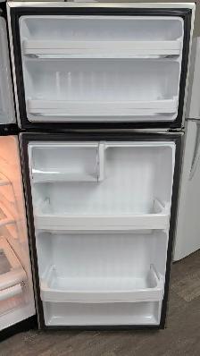 Stainless Steel GE Refrigerator - Photo 2