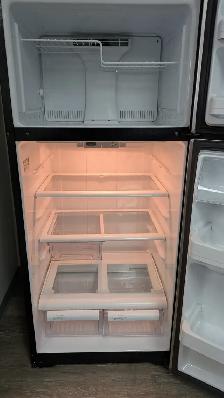 Stainless Steel GE Refrigerator - Photo 3