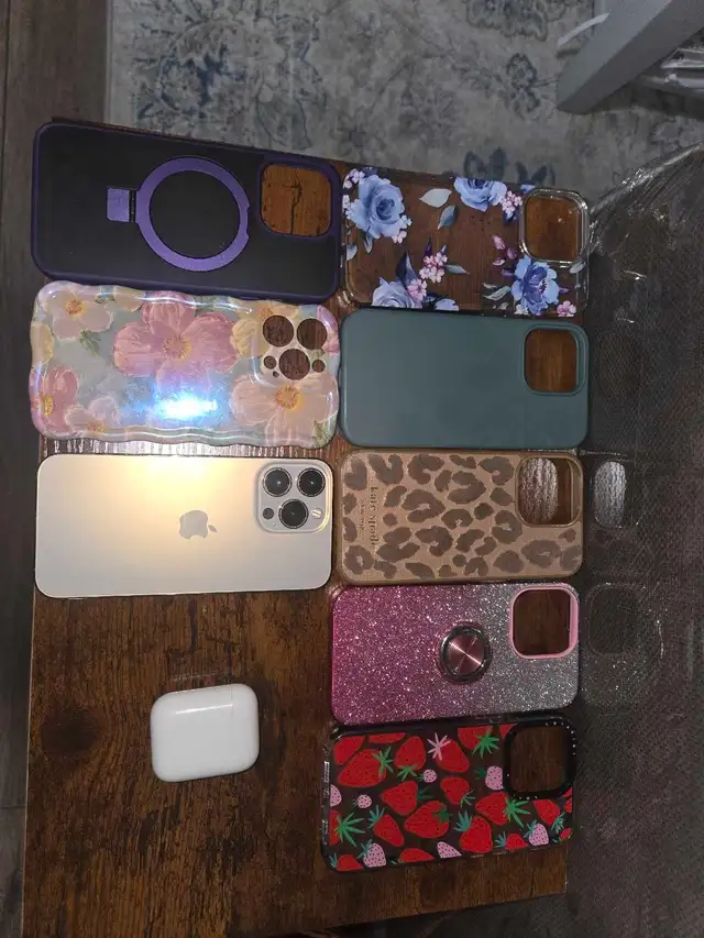 iPhone 13 w/ 7 cases   AirPods