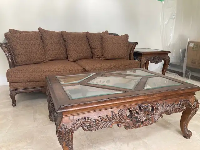 Chair and sofa with coffee table and side table