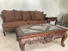 Chair and sofa with coffee table and side table