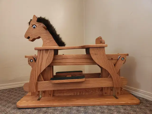 CHILD GLINDING HORSE