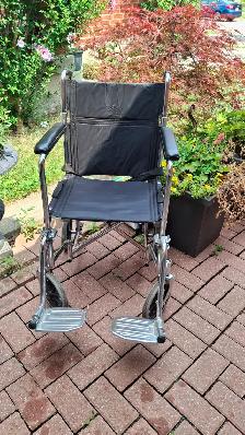 Wheelchair folding transport
