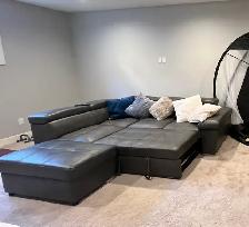 Faux leather sofa set with pull out bed and ottoman - Photo 5