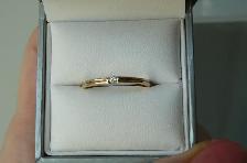 BAGUE en Or Jaune 10 K. sertie d'un Diamant de 3 Points ( 7.5 )