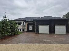 Stunning Custom-Built Built Home With Private Yard