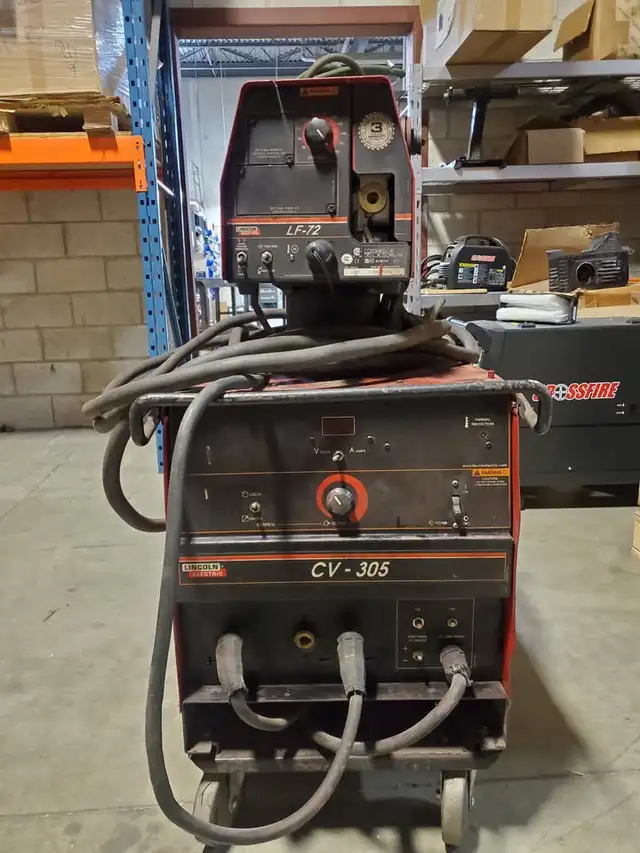 Used Lincoln Electric CV-305 power source with LF-72 wire feeder