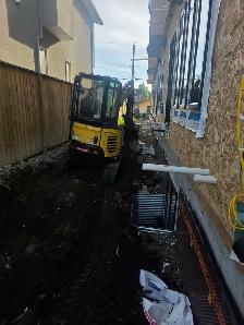 excavations and bobcat - Photo 3