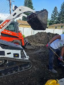excavations and bobcat - Photo 6