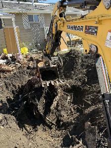 excavations and bobcat - Photo 9