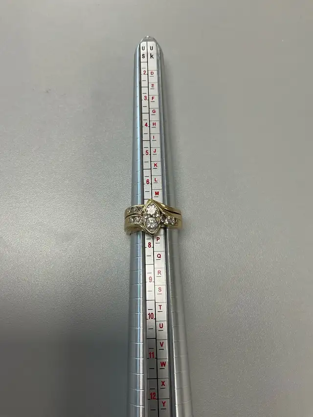 14k 13.64g with real diamonds size 7.5