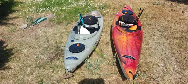 2 kayaks and paddles for sale Pelican Premium
