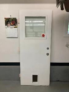 32x80 Steel Entry Door Comes with Installed Dog Door $40 - Photo 2