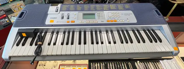 Casio LK-110 Piano Music Keyboard with Power Cord & Bookstand