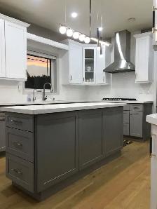 All wood kitchen and bath cabinets and countertop