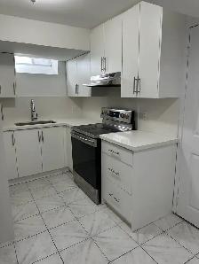 NEW 3-Bdr Legal Basement Apt — Private Entry, Parking, & Laundry - Photo 9