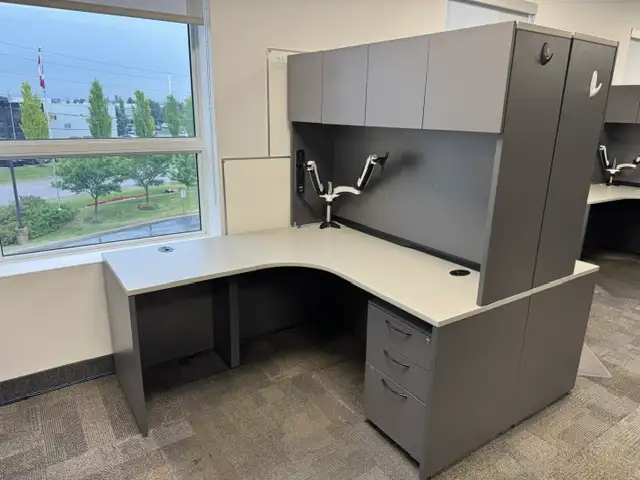 Desks/ 60x60 corner workstations with hutch $750.00 excel conit