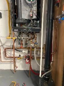 Tankless hot water repair and installation - Photo 3