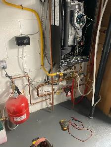 Tankless hot water repair and installation - Photo 4