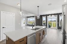 2189sqft Kensington show home w/ fully-finished walk out bsmt! - Photo 3